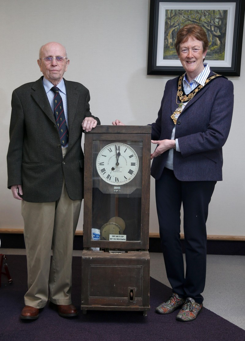 99-year-old Norman Irwin and the Mayor of Causeway Coast and Glens Borough Council Councillor Joan Baird OBE pictured with the clock which is set to go on display in Garvagh Museum.