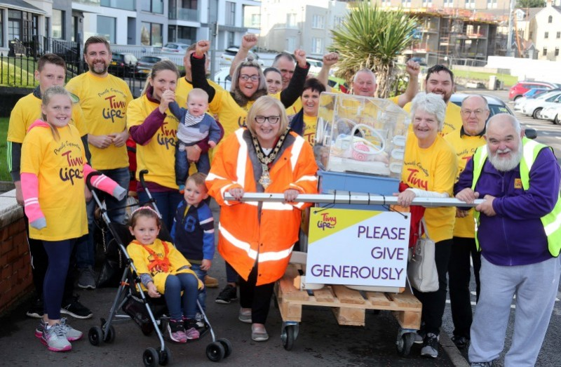 The Mayor of Causeway Coast and Glens Borough Council Councillor Brenda Chivers pictured with her team of volunteers as they begin the Incubator Push from Portstewart Town Hall to The Crannagh on the Portstewart Road outside Coleraine.