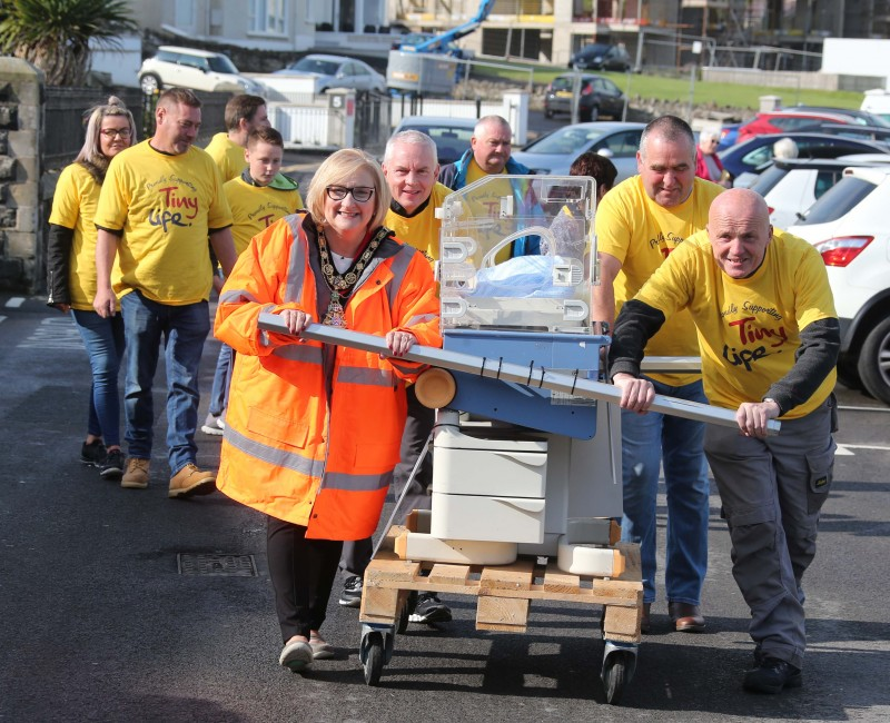 The Mayor of Causeway Coast and Glens Borough Council Councillor Brenda Chivers pictured with her team of volunteers as they begin the Incubator Push from Portstewart Town Hall to The Crannagh on the Portstewart Road outside Coleraine.