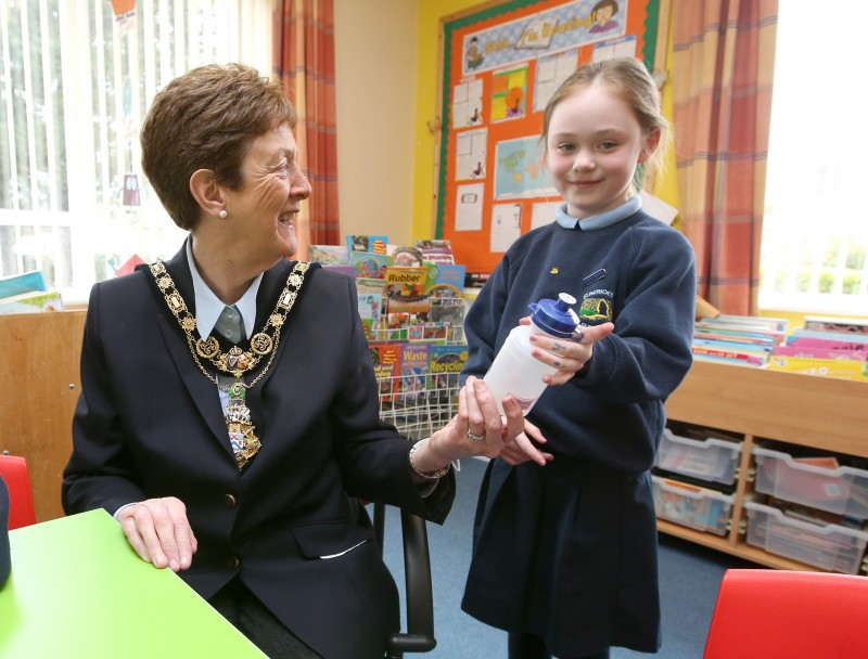 Using reusable drinks bottles is one way pupils at St Patrick's Primary School in Glenariff are doing their bit for the environment as this young pupil demonstrates to the Mayor of Causeway Coast and Glens Borough Council Councillor Joan Baird OBE.