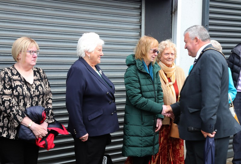 The Mayor of Causeway Coast and Glens Borough Council Councillor Ivor Wallace speaks with guests who attended the service and memorial stone dedication on Sunday 12th June, the 49th anniversary of the Coleraine bomb.