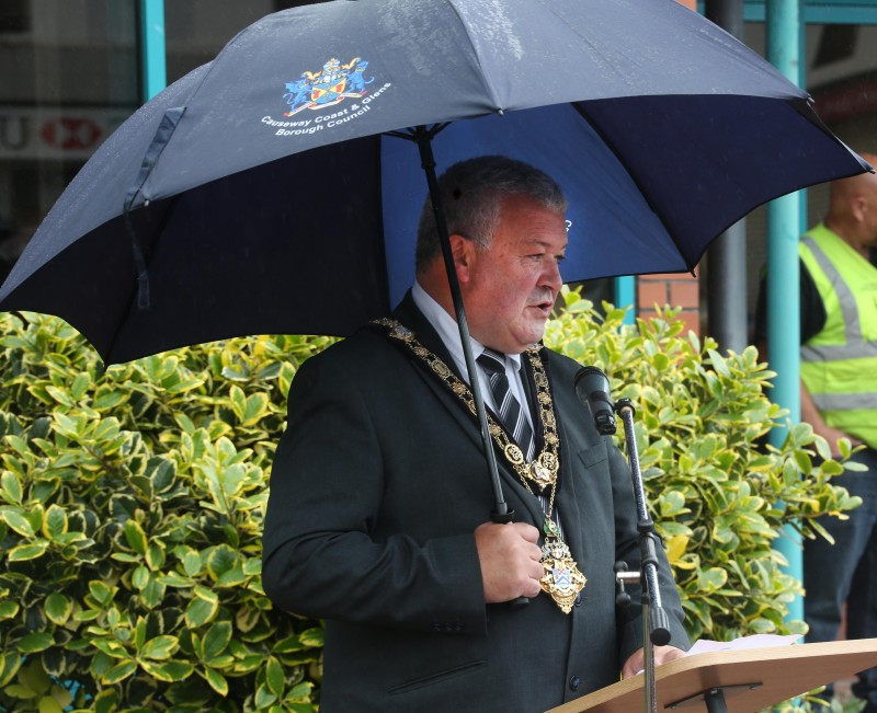 The Mayor of Causeway Coast and Glens Borough Council Councillor Ivor Wallace opens the service in Coleraine.