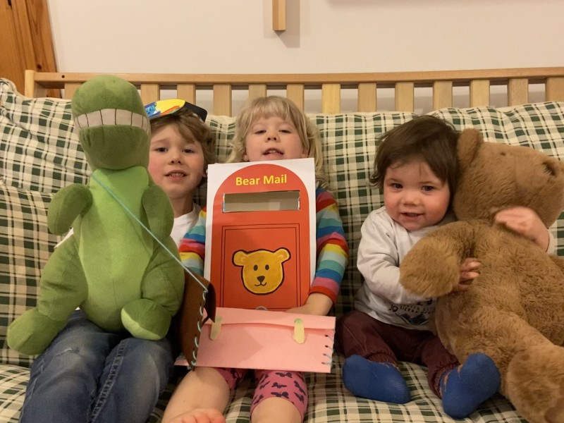 Joshua (5), Evelyn (3) and Benjamin (1) created their own portrait stamp and postcards as part of ‘From me to you- A journey of a postcard’, which saw children explore the journey of one little Bear’s postcard to his Granda Bear.