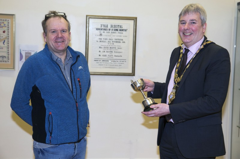 The Mayor of Causeway Coast and Glens Borough Council Councillor Richard Holmes pictured with Alan Millar, winner of the Hugh MacDiarmid Tassie for Poetry from the Scottish Language Society.