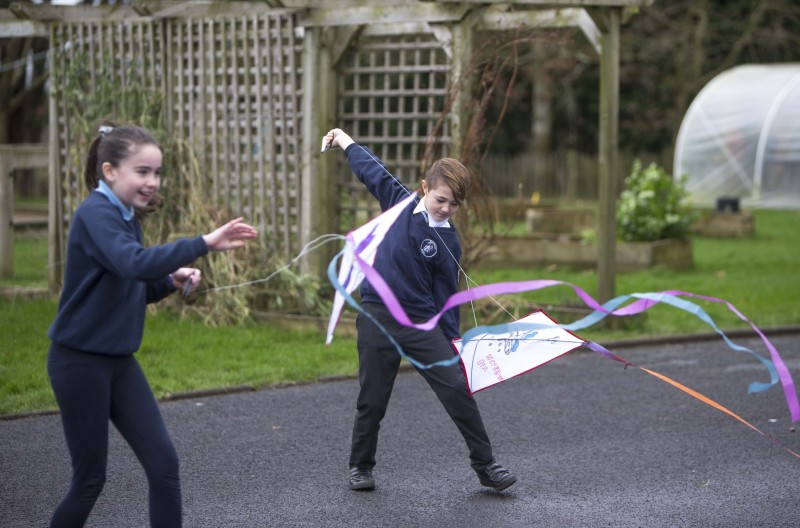 Pupils from St Joseph’s Primary School (Dunloy) and The Model Controlled Integrated Primary School (Ballymoney) have fun with kites during their Shared Education event.