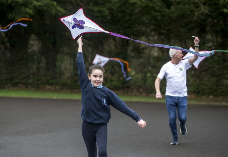 Pupils from St Joseph’s Primary School (Dunloy) and The Model Controlled Integrated Primary School (Ballymoney) have fun with kites during their Shared Education event.