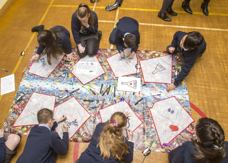 Pupils from St. Joseph’s Primary School in Dunloy and The Model Primary School in Ballymoney get together to design their kites during their Shared Education event.