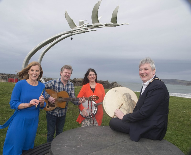 Causeway Coast and Glens Borough Council’s Destination Manager Kerrie McGonigle, traditional musician Michael Sands, Visitor Servicing Officer Caroline Carey and the Mayor of Causeway Coast and Glens Borough Council Councillor Richard Holmes pictured in Ballycastle for the launch of the town’s new Traditional Music Trail.
