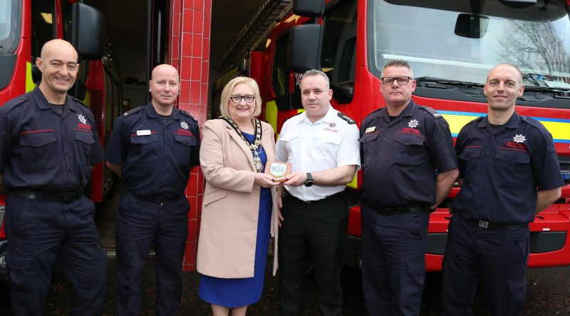 The Mayor of Causeway Coast and Glens Borough Council Councillor Brenda Chivers pictured with NIFRS Coleraine Branch District Commander John Bacon, crew commanders and firefighters.