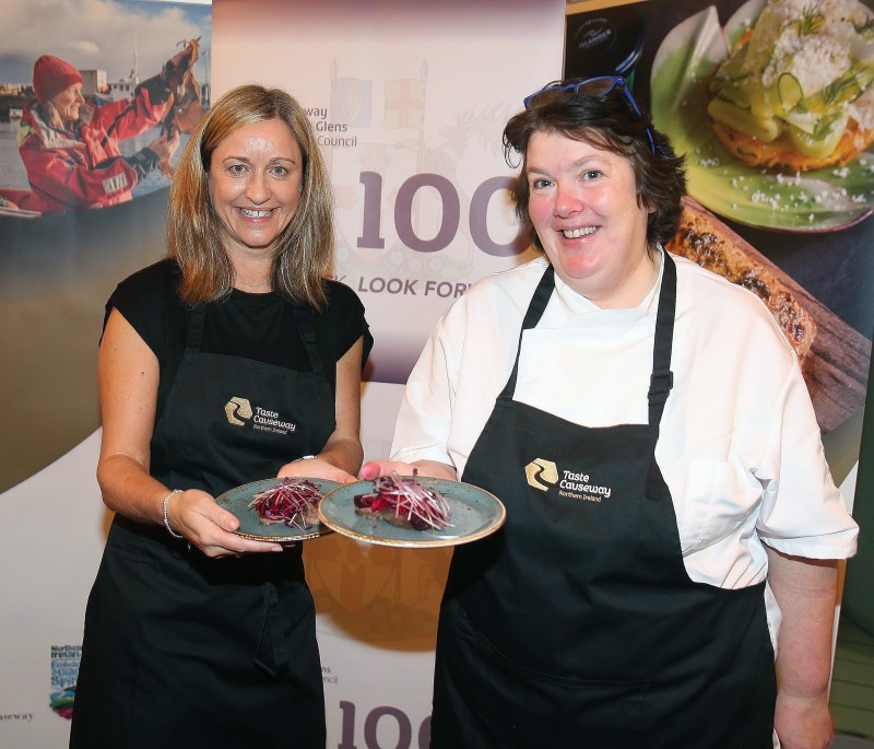 Sharon Scott from the Taste Causeway collaborative network and chef Paula McIntyre pictured at the special celebration of local produce held in the Arcadia building in Portrush as part of Causeway Coast and Glens Borough Council’s NI 100 programme.