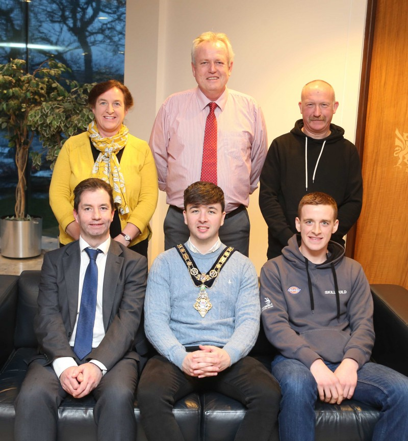 Front row L - R, Mel Higgins, Northern Regional College Vice Principal and Chief Operating Officer; Mayor of Causeway Coast and Glens Borough Council, Councillor Sean Bateson ; Samuel Gilmore , carpentry apprentice at Northern Regional College who is a former NI Young Apprentice of the Year,  gold medallist at WorldSkills UK LIVE and winner of a European Alliance for Apprentices Award. Back row, L-R Edelene Gilmore, Ian Forsythe, carpentry lecturer at Northern Regional College and Henry Gilmore.