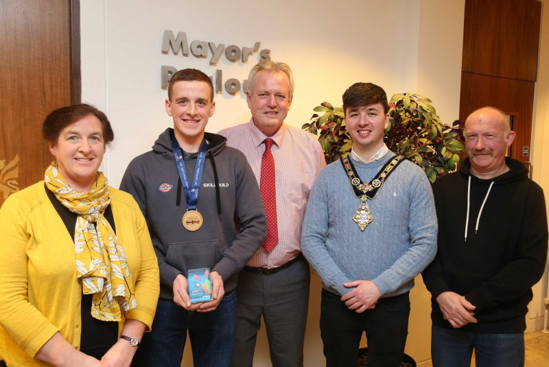 Northern Regional College carpentry apprentice, Samuel Gilmore with the Mayor of Causeway Coast and Glens Borough Council, Councillor Sean Bateson, his parents Edelene and Henry Gilmore and carpentry lecturer, Ian Forsythe. Samuel, a former NI Young Apprentice of the Year and gold medallist at WorldSkills UK LIVE, was presented with a European Alliance for Apprentices Award in Helsinki, Finland in October