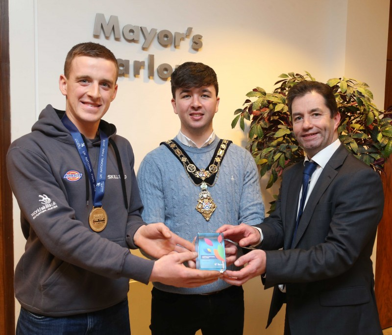 Mayor of the Causeway Coast and Glens Borough Council, Sean Bateson with Samuel Gilmore, Mel Higgins, Northern Regional College Vice Principal and Chief Operating Officer. Samuel, a former NI Young Apprentice of the Year and gold medallist at WorldSkills UK LIVE, was presented with a European Alliance for Apprentices Award in Helsinki, Finland in October.