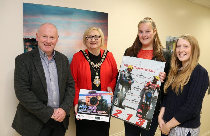 Rachel Barlow is pictured with her winning entry with the Mayor of Causeway Coast and Glens Borough Council, Councillor Brenda Chivers, Mervyn Whyte, NW 200 Race Director and Jamie Austin from Causeway Coast and Glens Borough Council’s Museum Services.