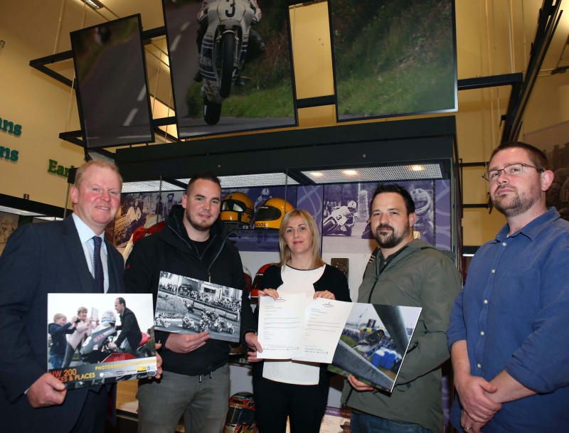 The winners of the People’s Choice awards in Causeway Coast and Glens Borough Council’s Museum Services ‘Capture the Moment’ photographic competition, Paul Allen from Drumahoe and Johnny Olphert from Desertmartin, pictured with Alderman Tom McKeown, Gillian Lloyd from the Vauxhall International North West 200 and Nic Wright from Museum Services.