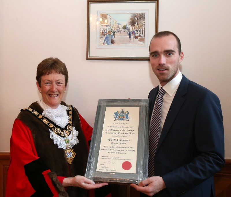 The Mayor of Causeway Coast and Glens Borough Council, Councillor Joan Baird OBE, presents Peter Chambers with his Freedom Certificate.