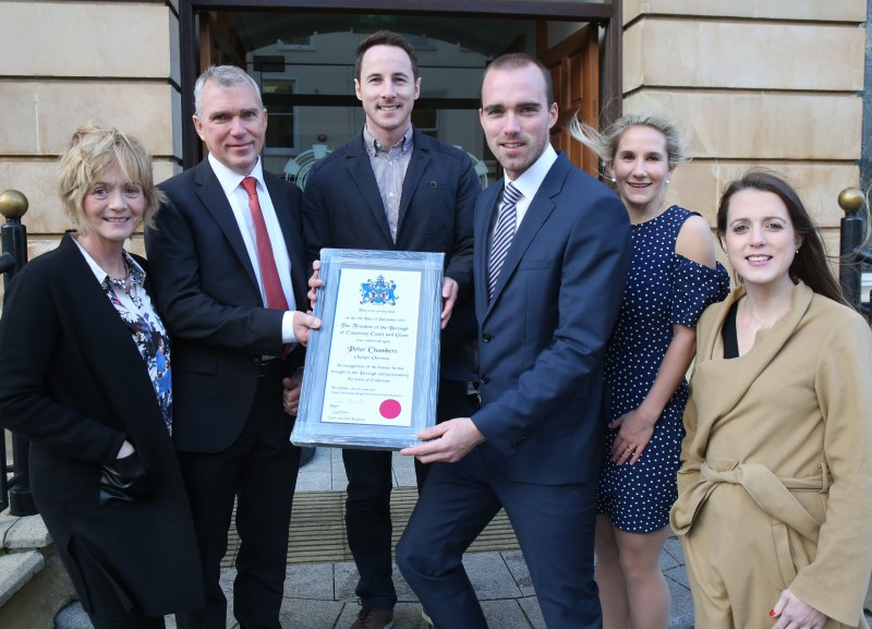 Peter Chambers pictured on the steps of the Town Hall in Coleraine with members of his family after receiving his Freedom Certificate.