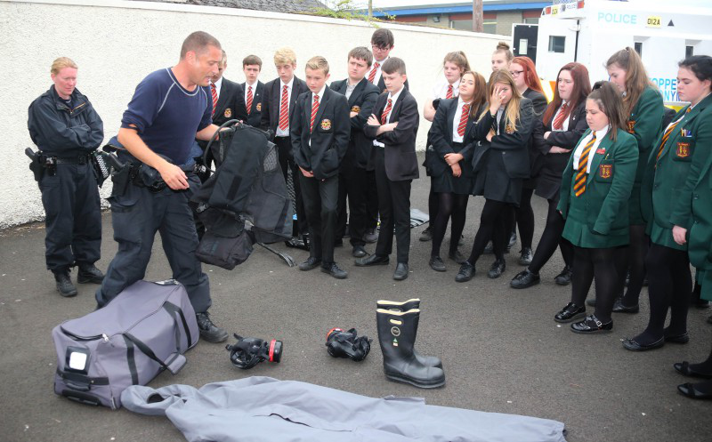 A safety demonstration takes place for the pupils by PSNI officers.