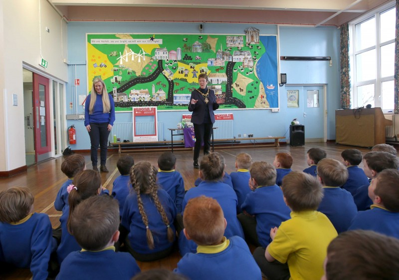 The Mayor of Causeway Coast and Glens Borough Council Councillor Joan Baird OBE speaks at a special assembly held in Hezlett Primary School to mark their 'Plastic Smart' award.