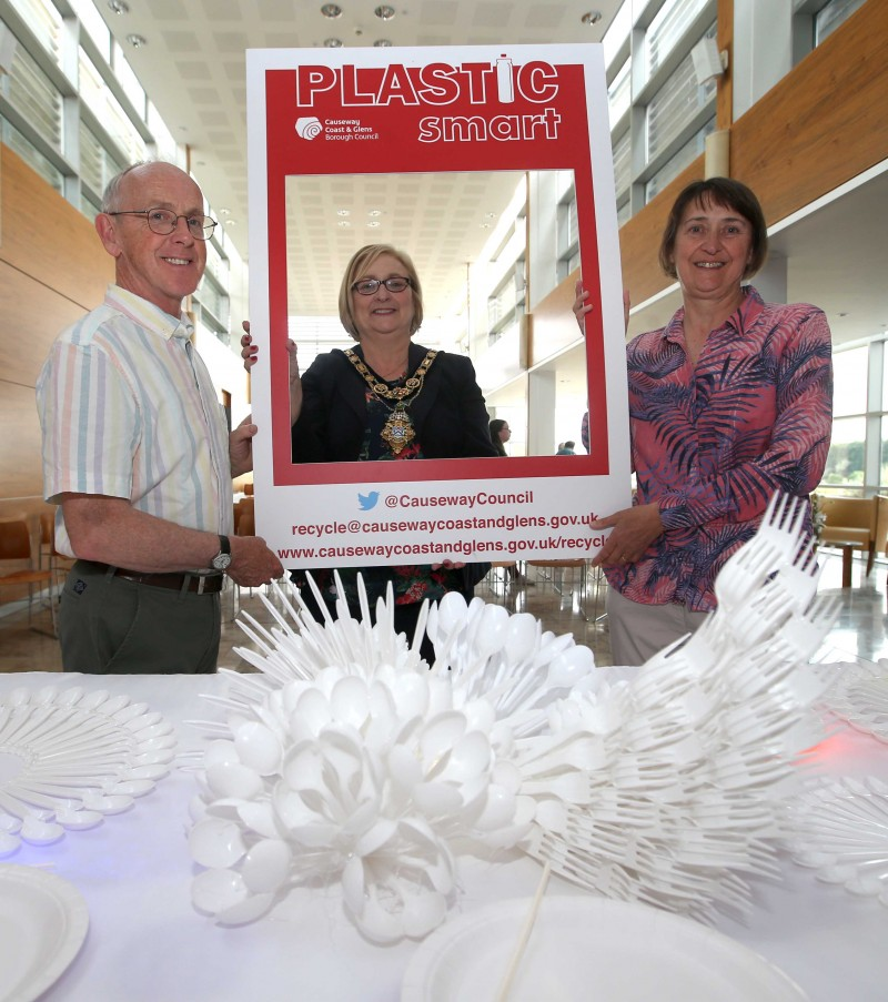 The Mayor of Causeway Coast and Glens Borough Council Councillor Brenda Chivers pictured with Kathryn Nelson and Dr Roy Nelson, creators of the 'Uniform of Debris' art installation which is currently on display in Cloonavin.