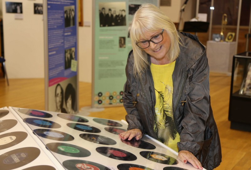 Helena Alcorn Espie browses some of the items on display in the new exhibition, ‘Let Me Introduce You: A History of Dance Halls in the Causeway Area’, which is now open in Coleraine Town Hall.