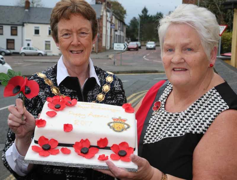 The Mayor of Causeway Coast and Glens Borough Council, Councillor Joan Baird OBE pictured with Breeze Galbraith and a special cake to mark the Poppy Appeal launch.