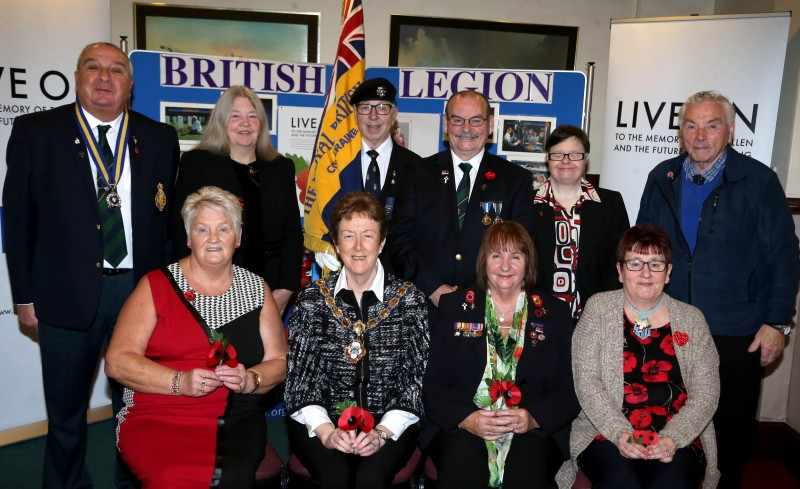 The Mayor of Causeway Coast and Glens Borough Council, Councillor Joan Baird OBE, joins with local RBL representatives in Coleraine to mark the launch of the Poppy Appeal.