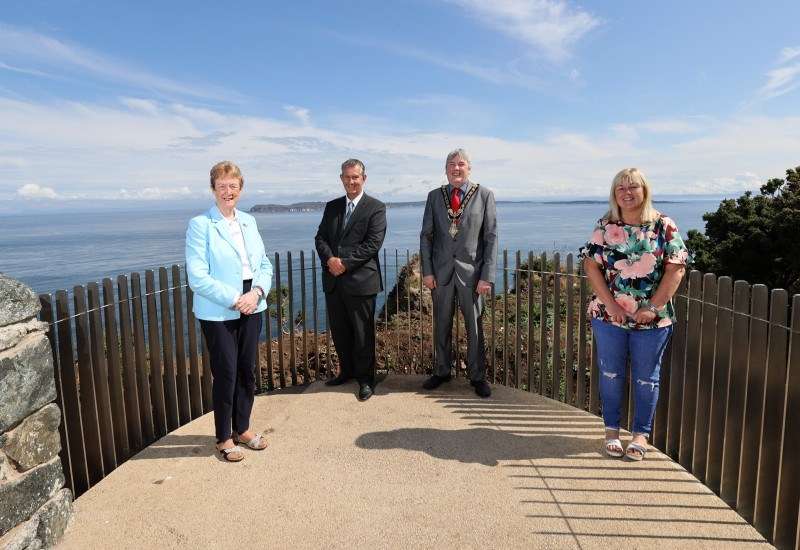 LAG member Alderman Joan Baird, Minister for Agriculture, Environment and Rural Affairs Edwin Poots, the Mayor of Causeway Coast and Glens Borough Council Councillor Richard Holmes and LAG member Councillor Margaret Anne McKillop pictured at Portaneevy outside Ballintoy where new viewing platforms are now available for the public to enjoy.