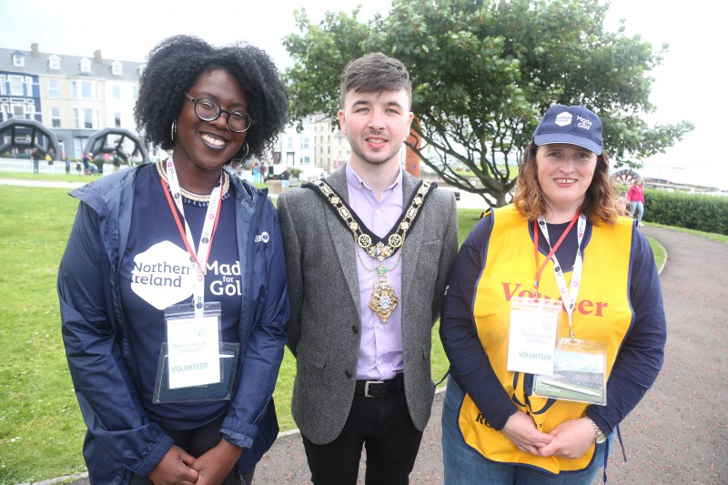 e Mayor of Causeway Coast and Glens Borough Council Councillor Sean Bateson pictured with two of the volunteers from Volunteer Now at Antrim Gardens.