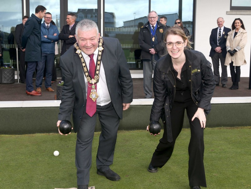 Dehenna Davison, Parliamentary Under-Secretary of State for the Department for Levelling Up, Housing and Communities, and the Mayor of Causeway Coast and Glens Borough Council, Councillor Ivor Wallace try out some bowling during the event at Portrush Recreation Grounds.