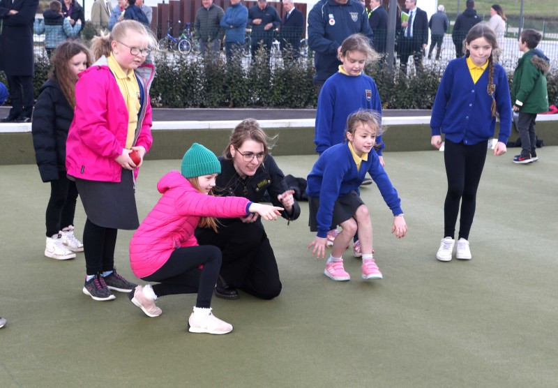 Dehenna Davison, Parliamentary Under-Secretary of State for the Department for Levelling Up, Housing and Communities enjoying her time in Portrush with pupils from Portrush Primary School.