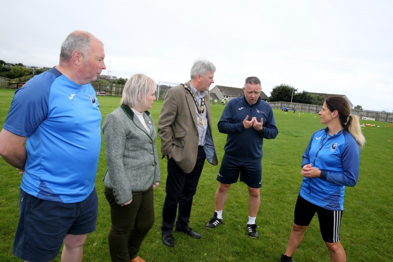 Pictured are The Mayor of Causeway Coast and Glens Borough Council and Chairperson of Council’s NI 100 Working Group, Councillor Michelle Knight-McQuillan with Adrian, Jonathan and Suzanne from Portstewart Football Club at the Football Summer Camp funded by Council’s NI 100 Centenary Small Grants Scheme