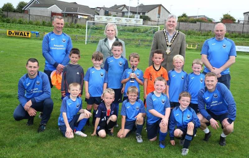 The Mayor of Causeway Coast and Glens Borough Council, Councillor Richard Holmes and Chairperson of Council’s NI 100 Working Group, Councillor Michelle Knight-McQuillan with the senior team and coaches at the at the Football Summer Camp in Portstewart funded by Council’s NI 100 Centenary Small Grants Scheme