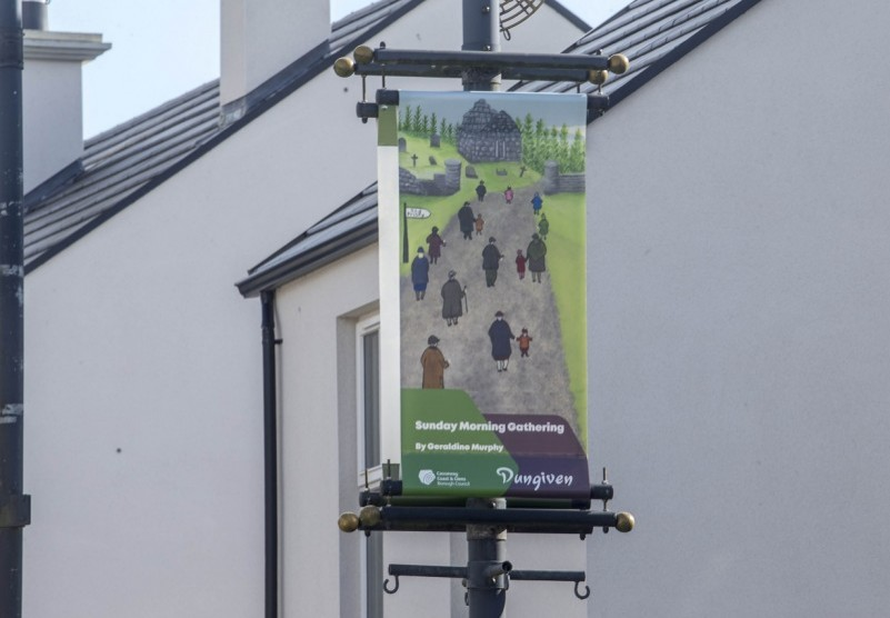Colourful and visually engaging banners reflecting the people, history and heritage of Dungiven have been installed to welcome visitors and  promote the importance of ‘Shop Eat Enjoy Local. The artworks were selected in a public art competition organised by Causeway Coast and Glens Borough Council’s Town and Village Management Team, in cooperation with local business and community representatives.