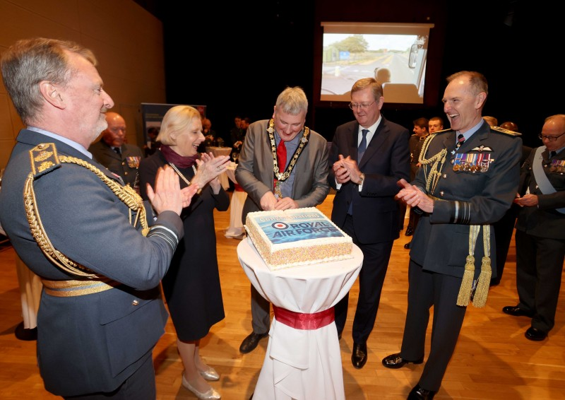 The Mayor of Causeway Coast and Glens Borough Council cuts the cake during the Freedom of the Borough event held in Limavady on Friday