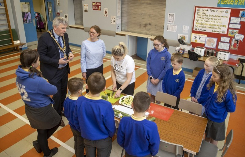 The Mayor of Causeway Coast and Glens Borough, Councillor Richard Holmes, chats with pupils from Rasharkin Primary School about their successful Health Food Choices project.