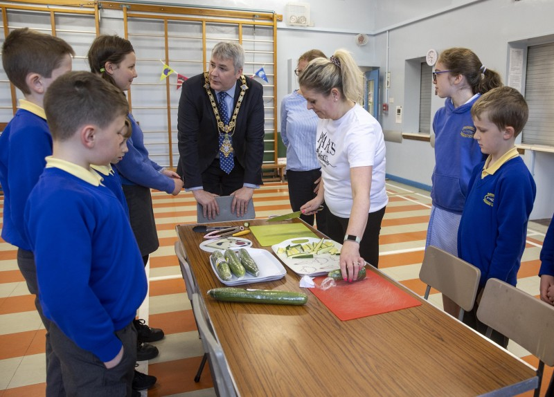 The Mayor of Causeway Coast and Glens Borough Councillor Richard Holmes chats with pupils from Rasharkin Primary School to find out more about their successful Health Food Choices project.