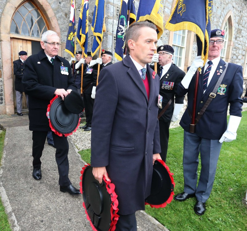 The Chief Executive of Causeway Coast and Glens Borough Council, David Jackson, pictured carrying his remembrance wreaths to St Thomas’ Church graveyard in Rathlin Island.