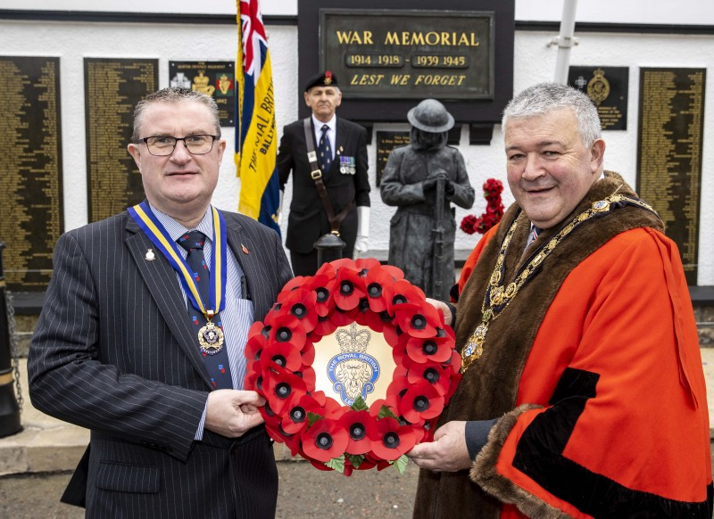 The Mayor of Causeway Coast and Glens Borough Council, Councillor Ivor Wallace, pictured at the Armistice Day service in Ballymoney with Mark McLaughlin from Ballymoney Royal British Legion and Standard Bearer Billy Davenport.