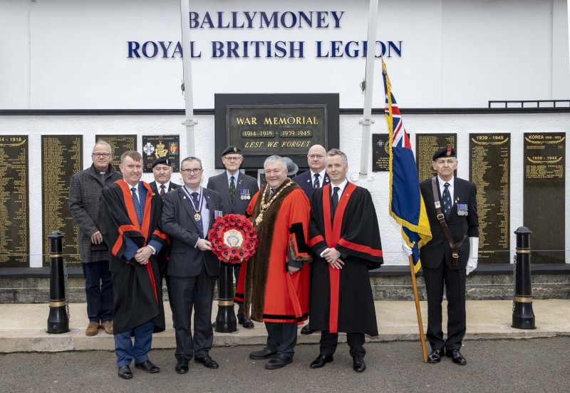 The Mayor of Causeway Coast and Glens Borough Council, Councillor Ivor Wallace, Councillor Mervyn Storey, and Councillor John McAuley pictured in Ballymoney for the annual Armistice Day service with some of those who participated in the service.