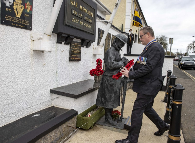 Mark McLaughlin from Ballymoney Royal British Legion lays a wreath at the town’s War Memorial on Armistice Day.