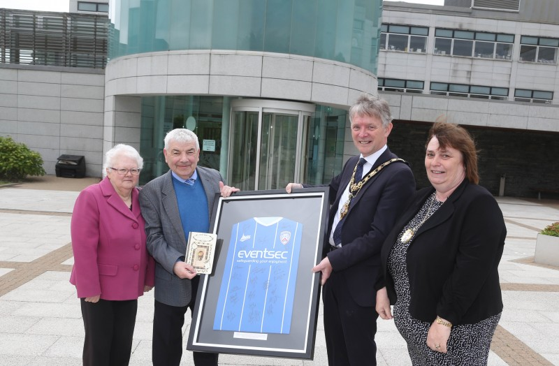 The Mayor of Causeway Coast and Glens Borough Council, Alderman Mark Fielding, and Mayoress, Mrs Phyliss Fielding, pictured at Cloonavin with George Robinson MLA and his wife Ann. Alderman Fielding presented Mr Robinson, a lifelong Coleraine FC fan, with a framed signed jersey to mark his 80th birthday.