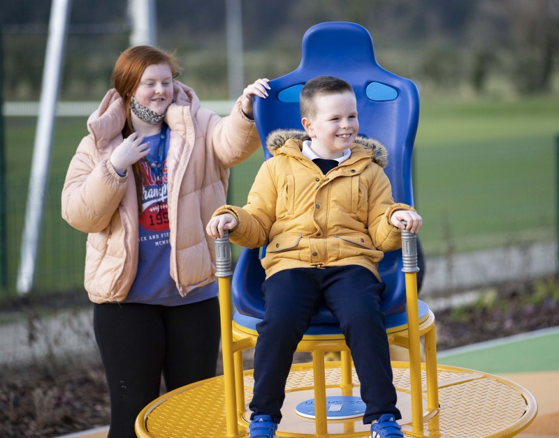 One of the young pupils from Rossmar School enjoys his visit to the official opening of Limavady's new Accessible Play Park.