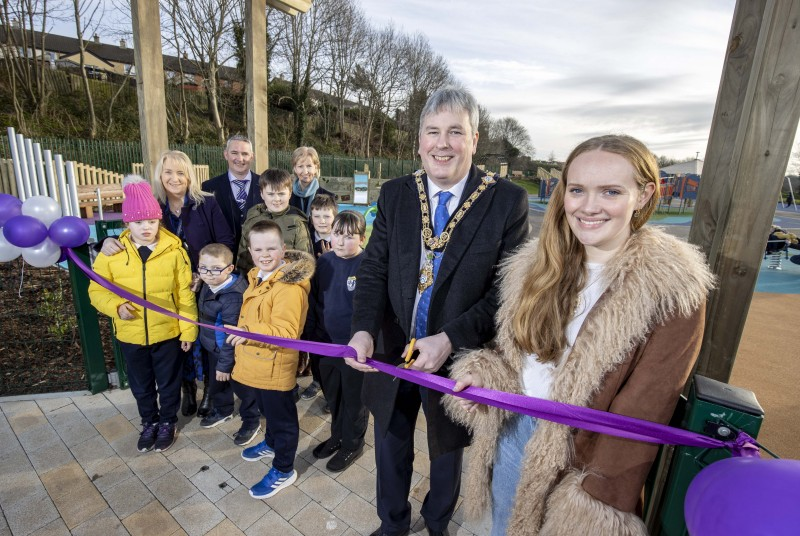 Limavady’s new Accessible Play Park is officially opened by the Mayor of Causeway Coast and Glens Borough Council Councillor Richard Holmes, Sally Holmes and pupils and staff from Rossmar School.
