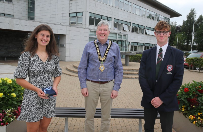 The Mayor of Causeway Coast and Glens Borough Council Councillor Richard Holmes pictured with Coleraine Grammar School pupils Rachel Bradley and Fergus Bryce who recently competed at the World Junior Championships in Bulgaria.