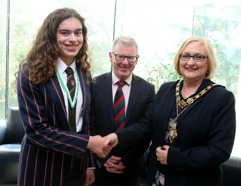 Under 23 Single Scull Irish Champion Molly Curry pictured with the Mayor of Causeway Coast and Glens Borough Council, Councillor Brenda Chivers and Coleraine Grammar school principal, Dr David Carruthers.