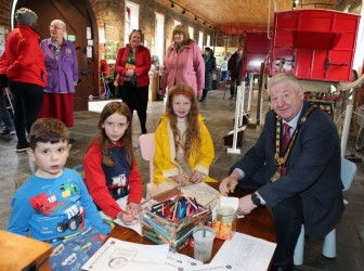 Mayor Steven Callaghan with children who attended the opening of Green Lane Museum
