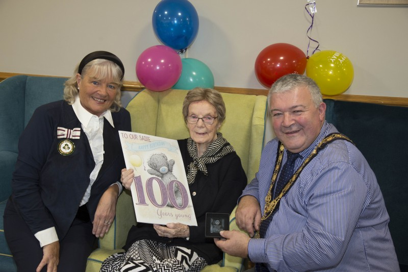 Deputy Lieutenant Lorraine Young and the Mayor of Causeway Coast and Glens Borough Council, Councillor Ivor Wallace, wish Sadie Gage many happy returns on her 100th birthday.
