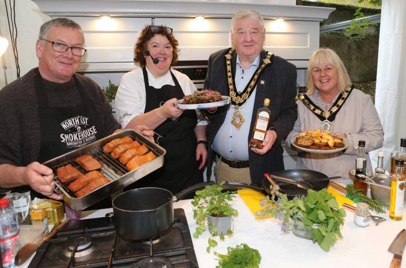 Pictured at the Bushmills Salmon and Whiskey Festival 2023, Mayor of Causeway Coast and Glens, Councillor Steven Callaghan with Deputy Mayor Councillor Margaret-Anne McKillop, Ruairidh Morrison of North Coast Smokehouse and celebrity chef Paula McIntyre.