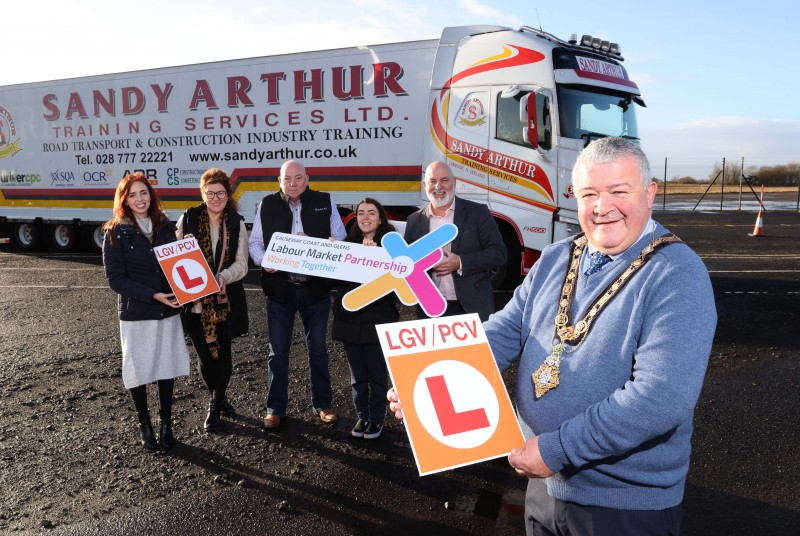 The Mayor of Causeway Coast and Glens Borough Council, Councillor Ivor Wallace pictured at the launch of the new transport academy, alongside Dearbhaile Hutchinson, Stefanie Martin, Sandy Arthur, Chloe Stewart, and Marc McGerty.